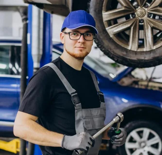 Taylormot mechanic in garage