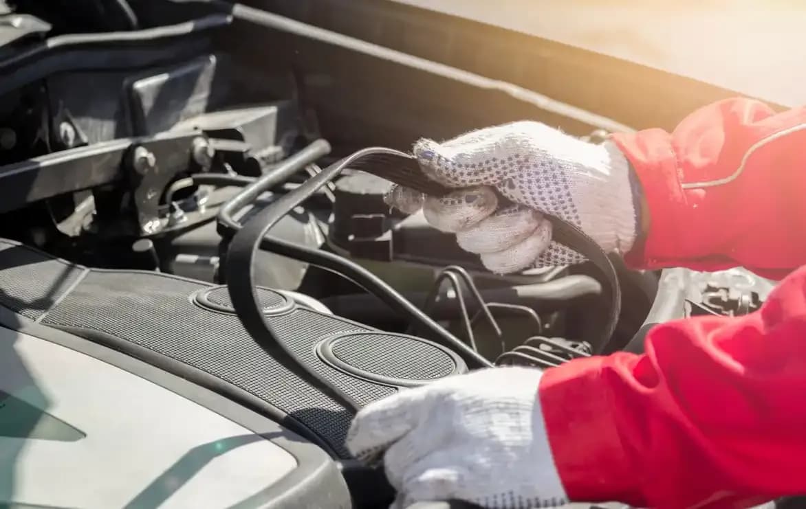 Mechanic ready for timing belt replacement