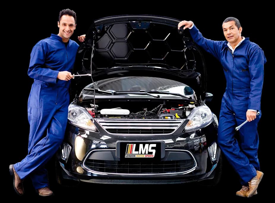 Mechanics completing an interim car service