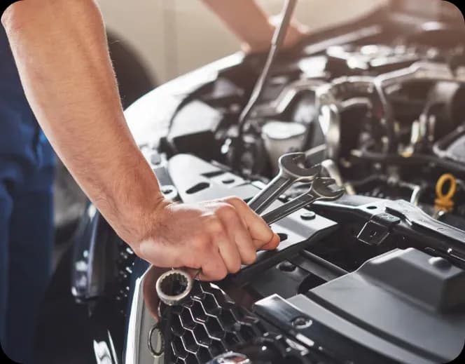 Mechanic working on a car