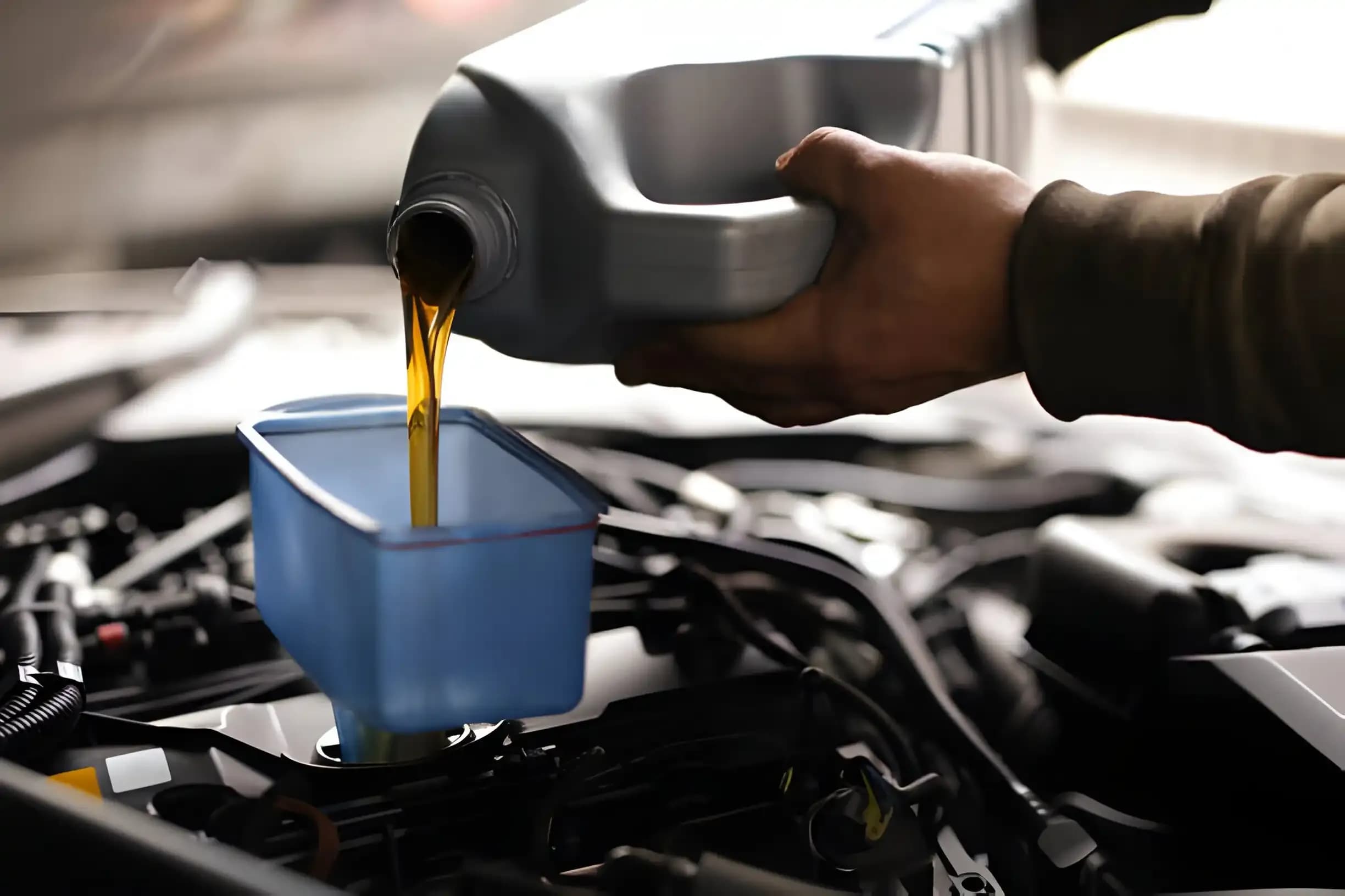 Transmission fluid service in a workshop