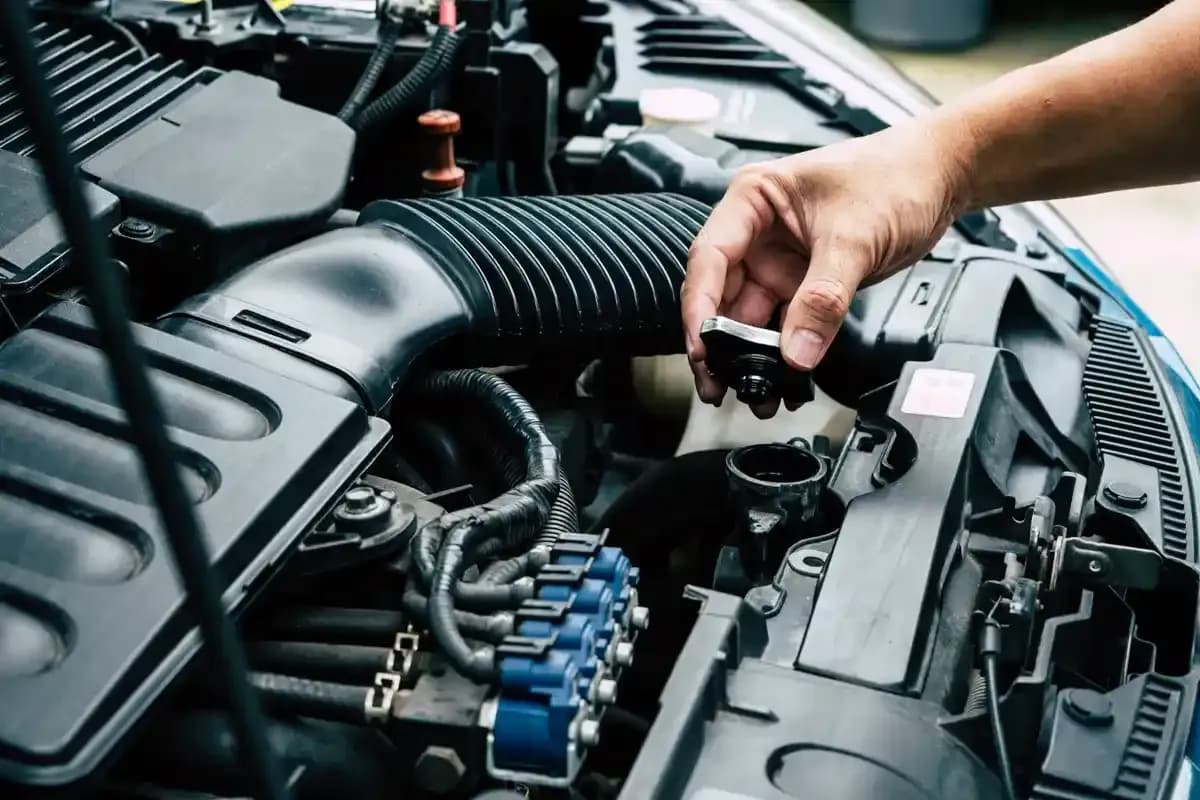 Mechanic ready for engine oil change