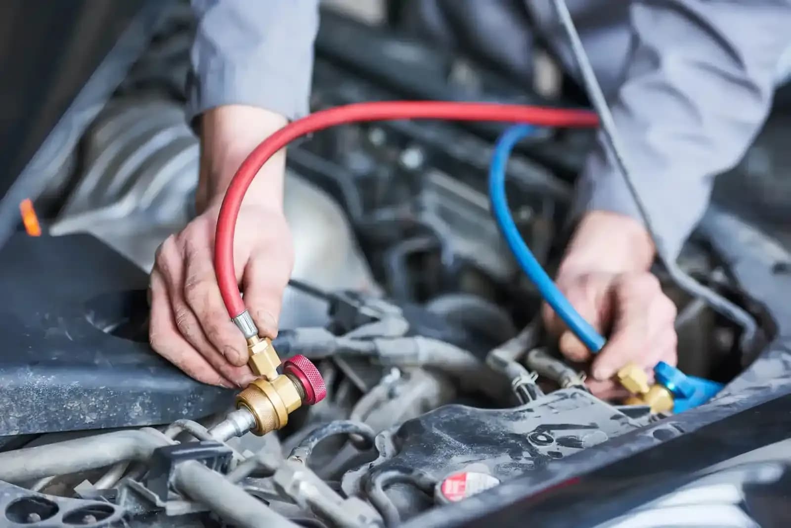Aircon regas service in progress
