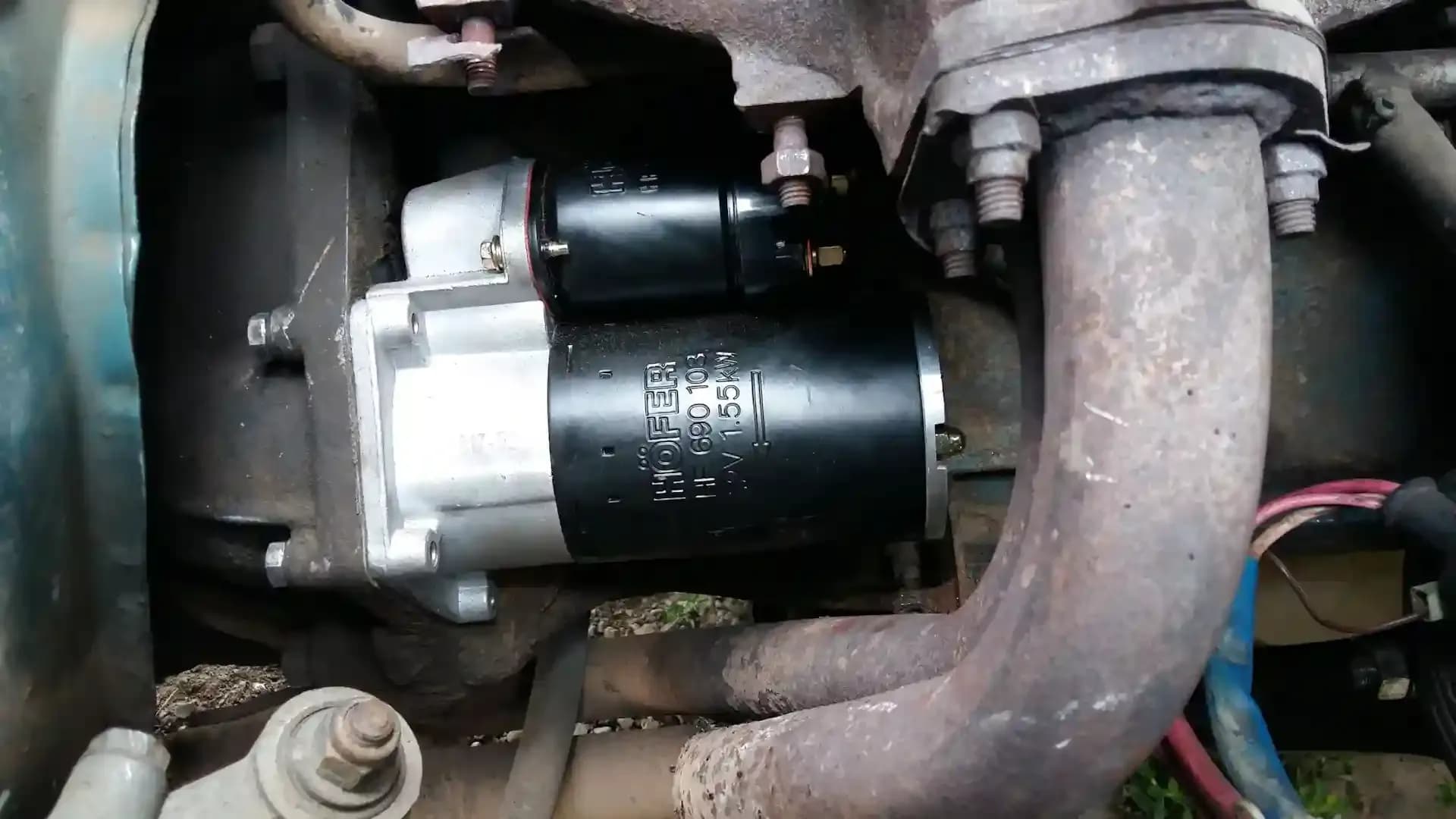 Starter motor replacement technician